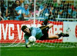 Packie Bonner making a saving during a penalty shoot out at the 1990 World Cup