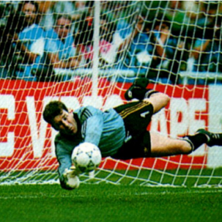 Packie Bonner making a saving during a penalty shoot out at the 1990 World Cup
